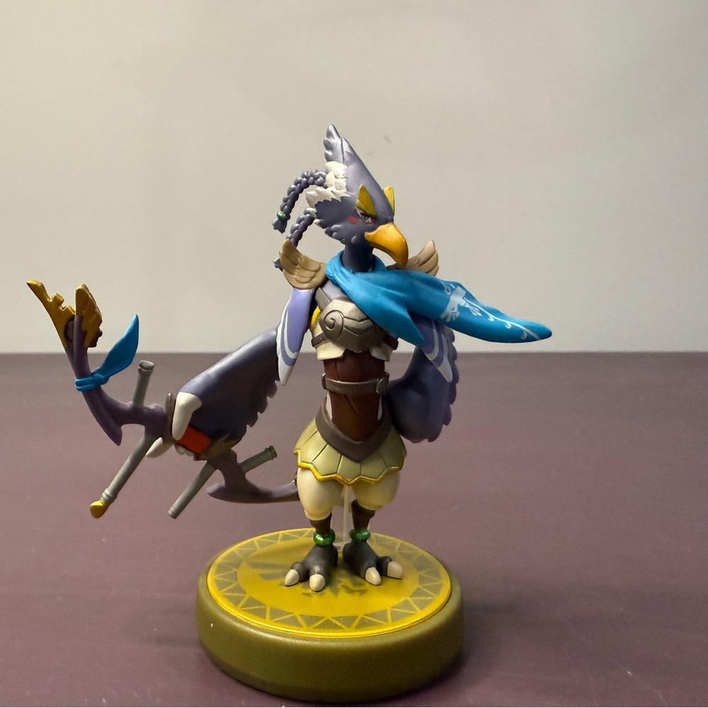 Colorful Bird Figurine with Bow